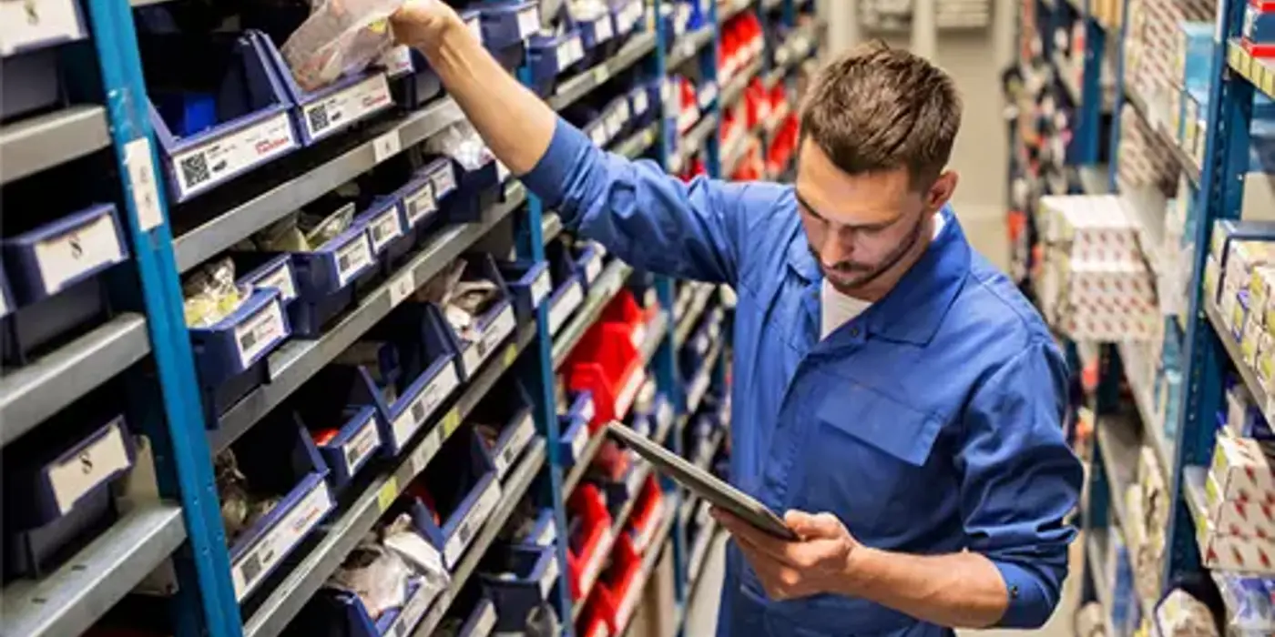 man-using-trackstock-inventory-management-software